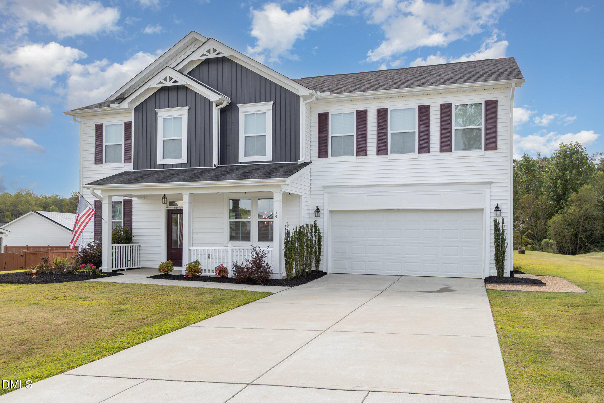 39 Calabor Court Fuquay-Varina, NC 27526 - Photo 2 of 40 a front view of a house with a yard