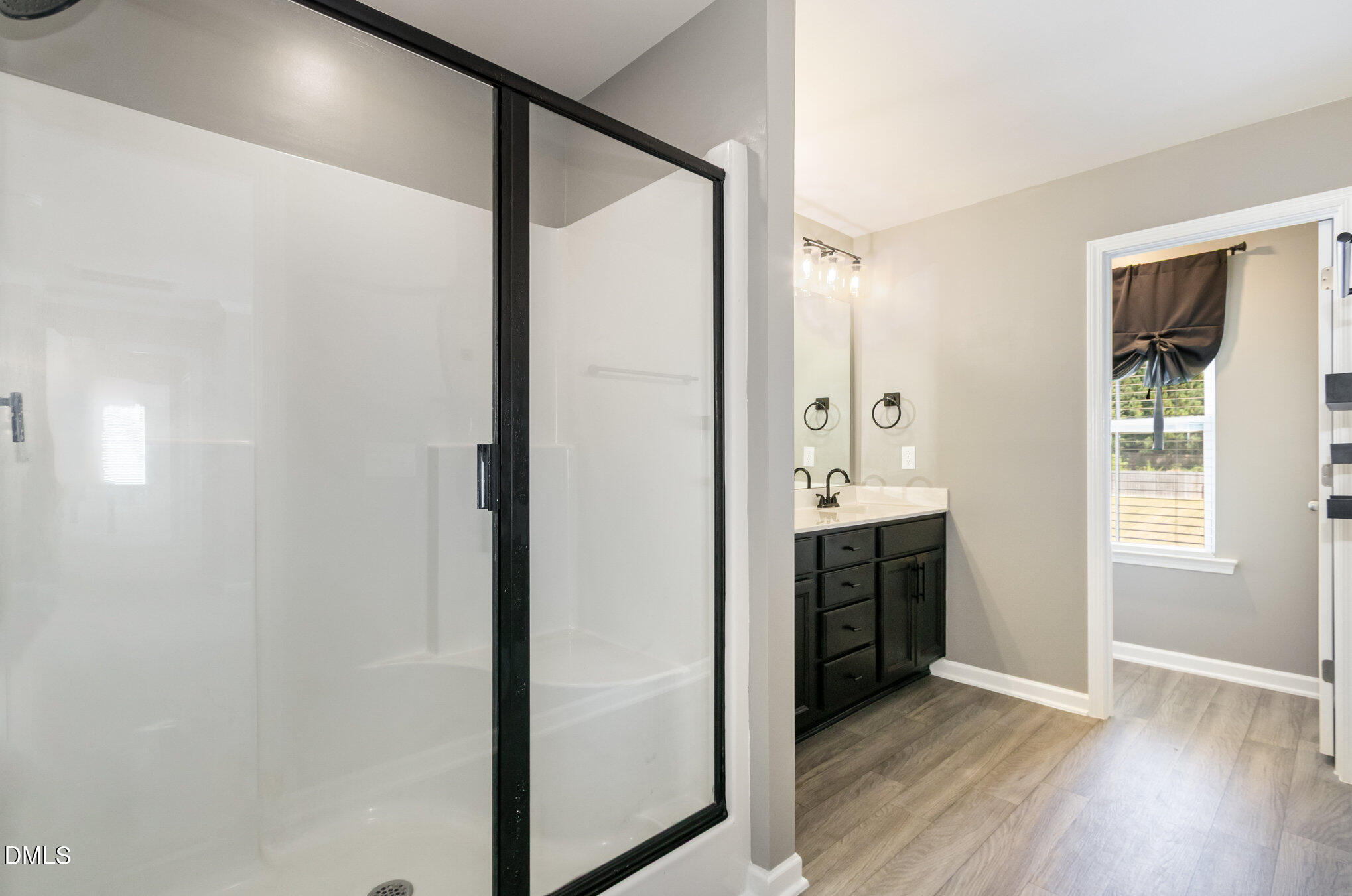 39 Calabor Court Fuquay-Varina, NC 27526 - Photo 31 of 40 a view of a bathroom from the hallway