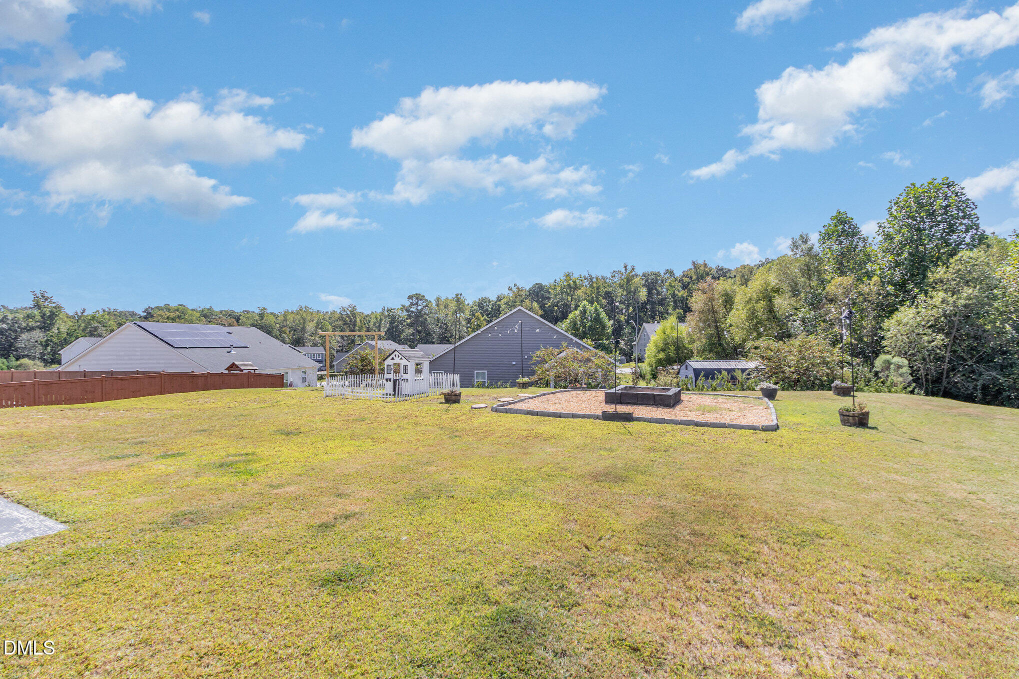 39 Calabor Court Fuquay-Varina, NC 27526 - Photo 35 of 40 a view of an swimming pool and an outdoor space