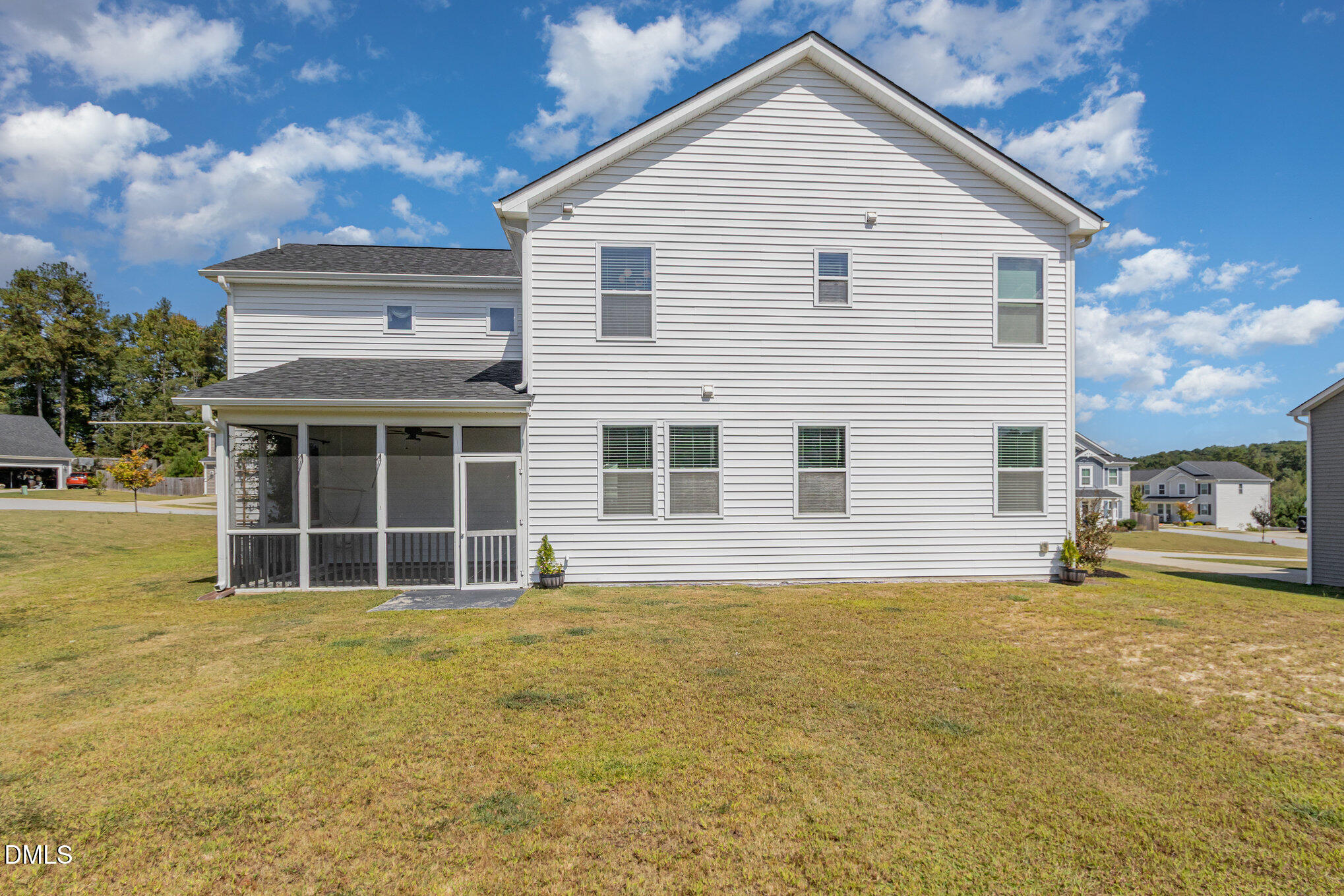 39 Calabor Court Fuquay-Varina, NC 27526 - Photo 36 of 40 a view of a house with a yard and sitting space