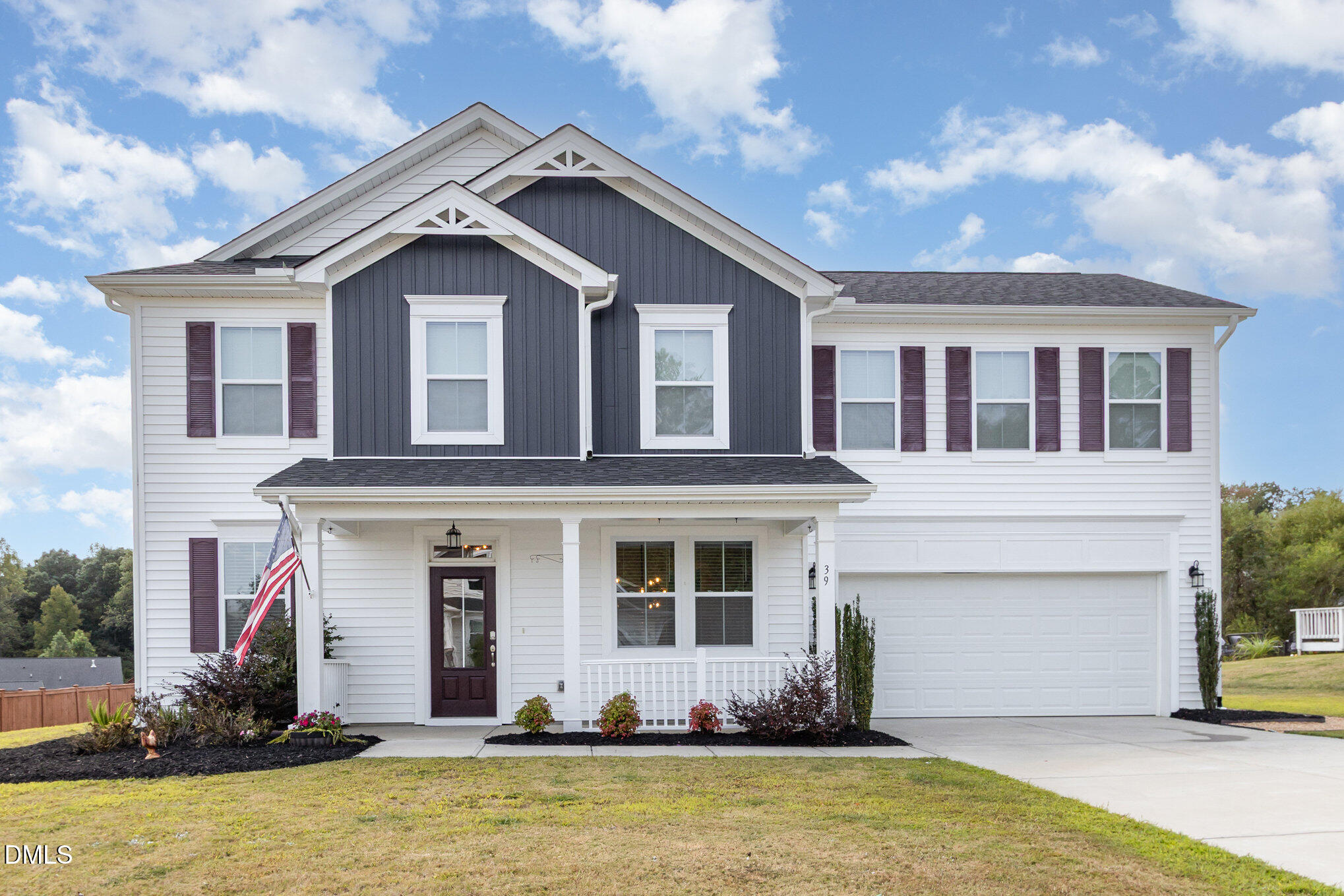 39 Calabor Court Fuquay-Varina, NC 27526 - Photo 3 of 40 a front view of a house with a yard