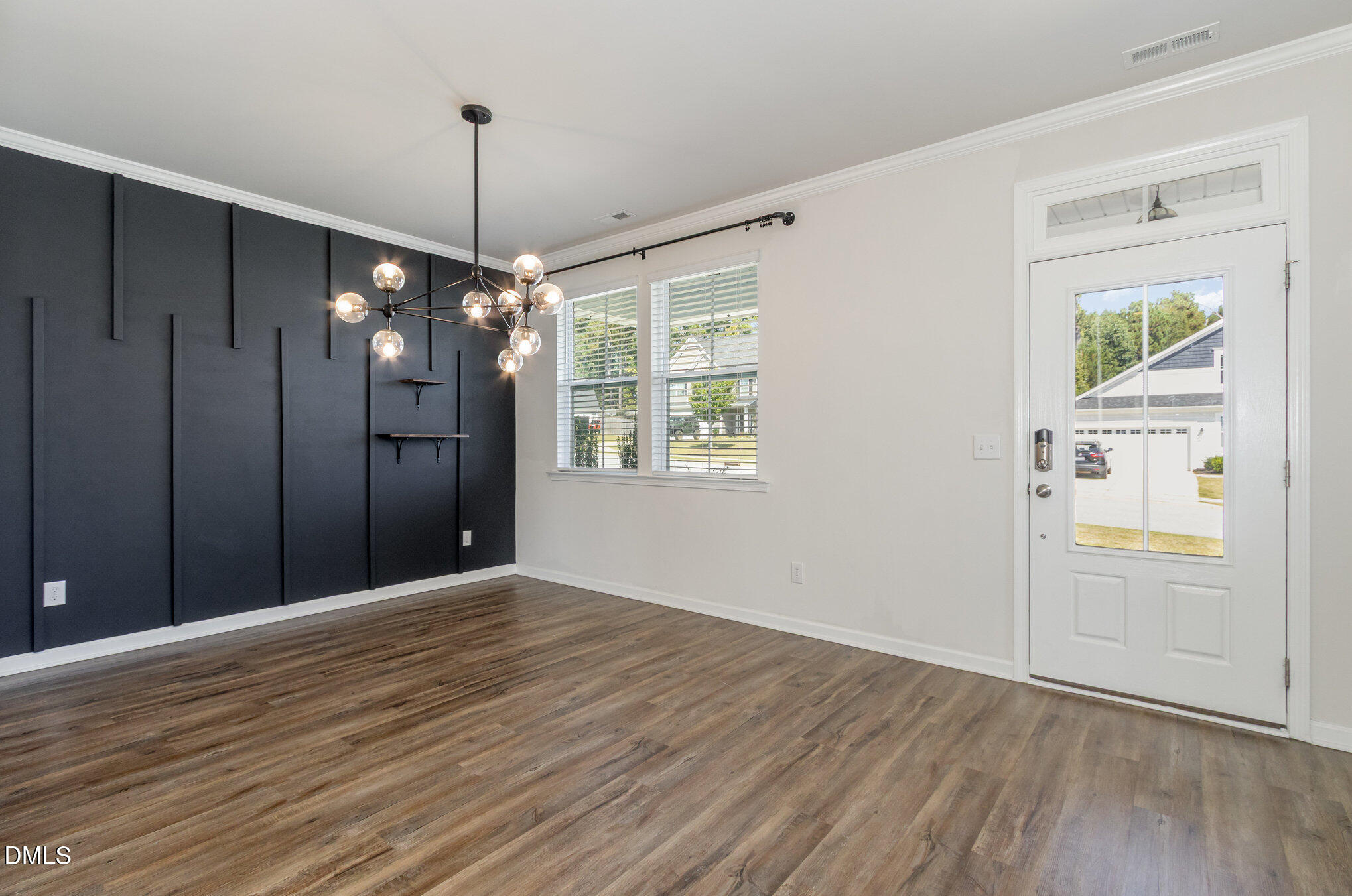 39 Calabor Court Fuquay-Varina, NC 27526 - Photo 5 of 40 a view of an empty room with window and cabinet