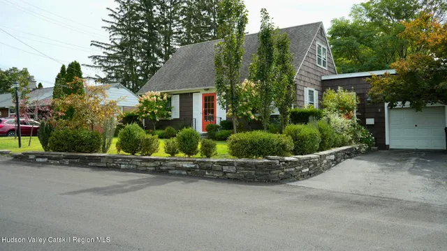 front view of a house with a street