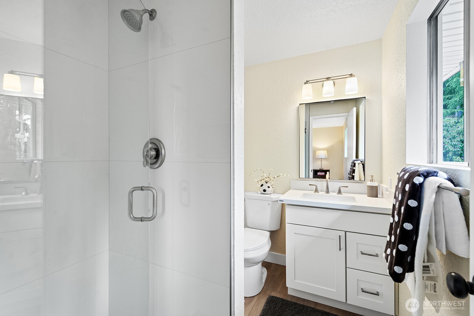 22032 3rd Place West Bothell, WA 98021 - Photo 12 of 20 a bathroom with a sink toilet and mirror