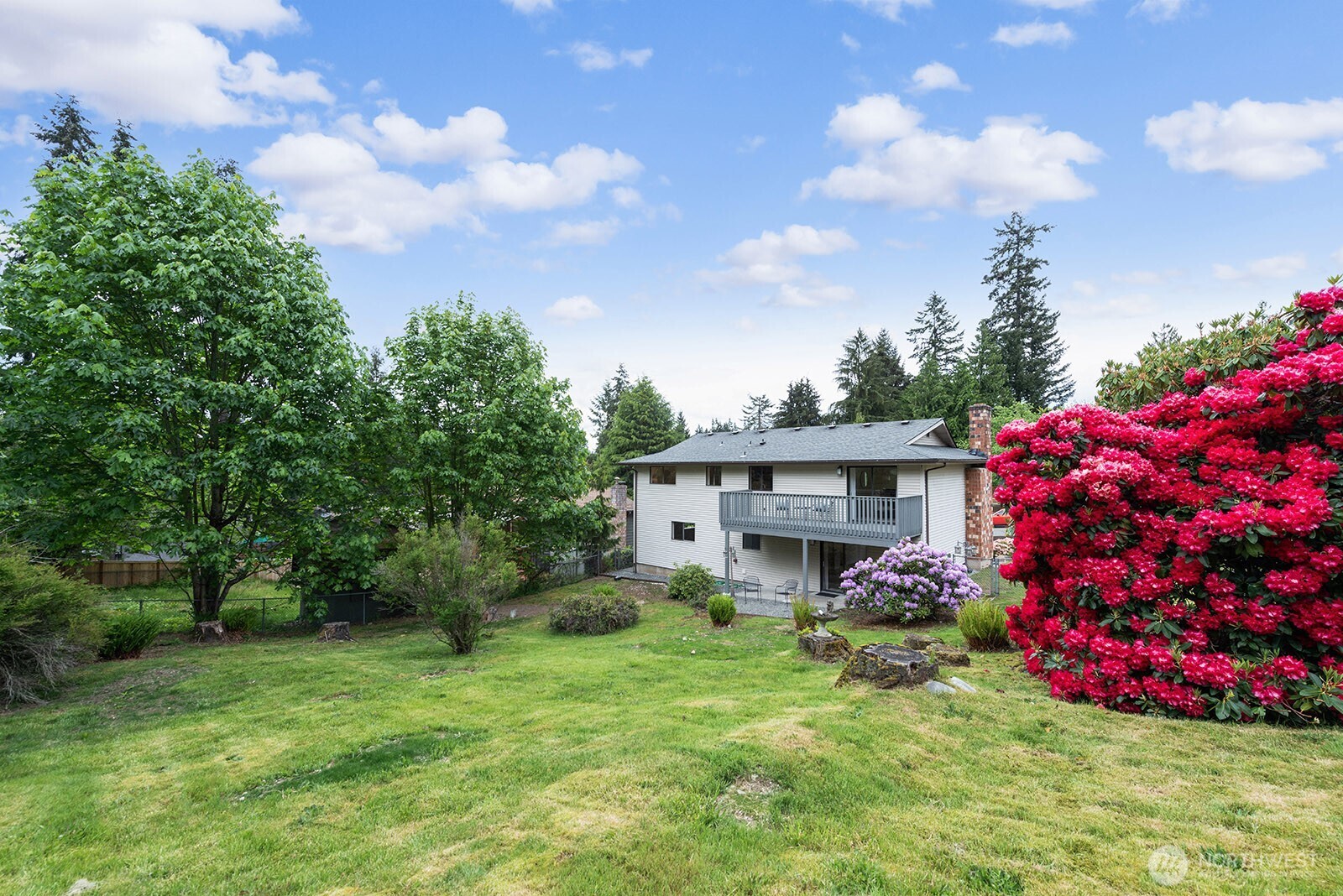 22032 3rd Place West Bothell, WA 98021 - Photo 17 of 20 a view of a house with a backyard