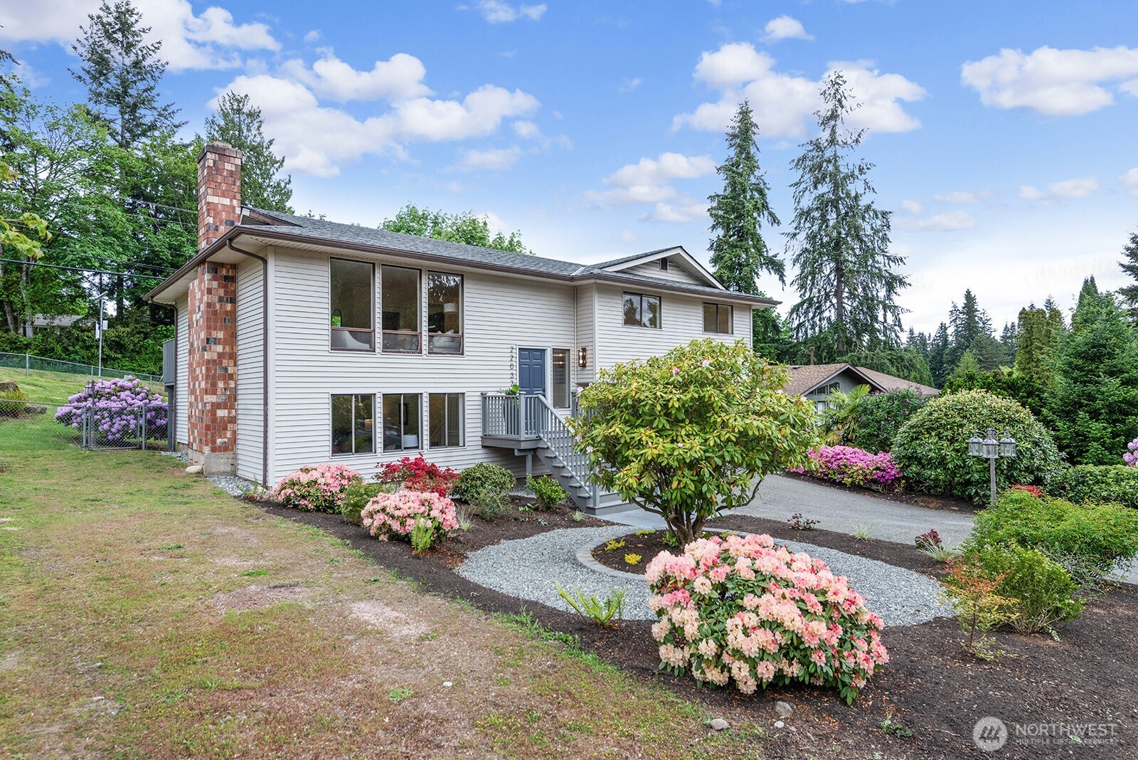 22032 3rd Place West Bothell, WA 98021 - Photo 18 of 20 a front view of a house with yard