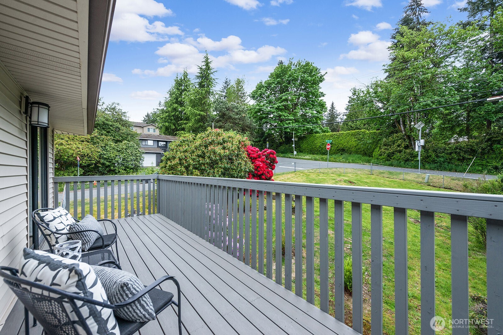 22032 3rd Place West Bothell, WA 98021 - Photo 19 of 20 a view of a deck with furniture and a yard