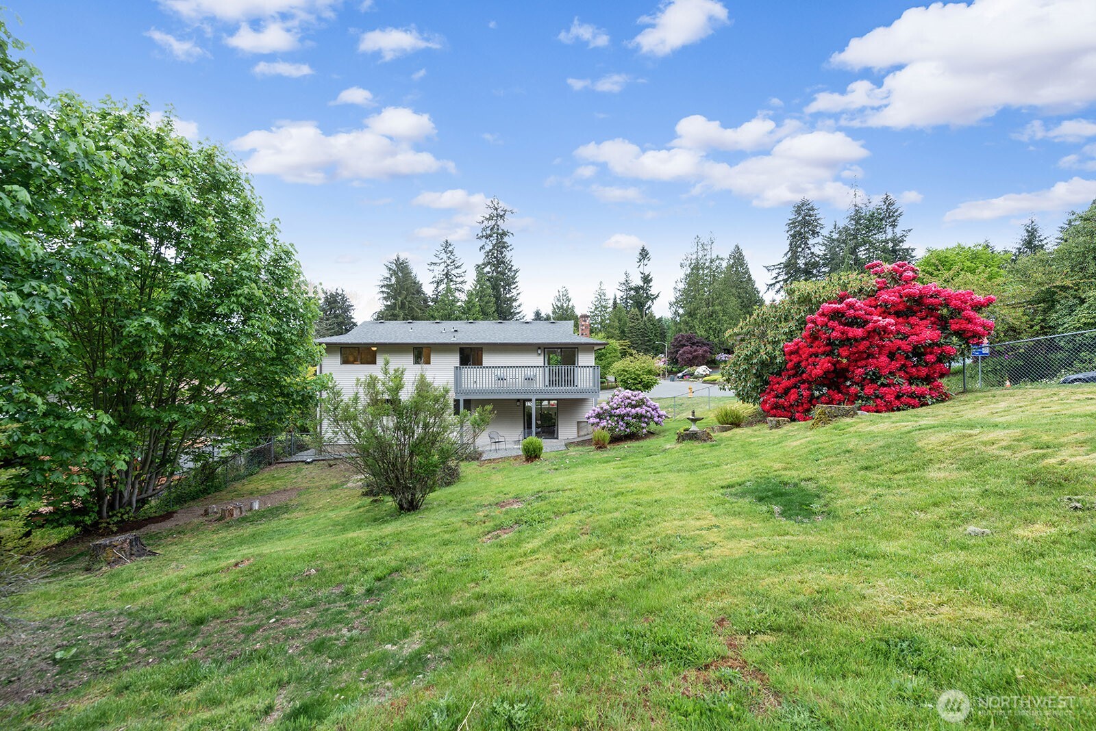 22032 3rd Place West Bothell, WA 98021 - Photo 20 of 20 a view of a house with a yard