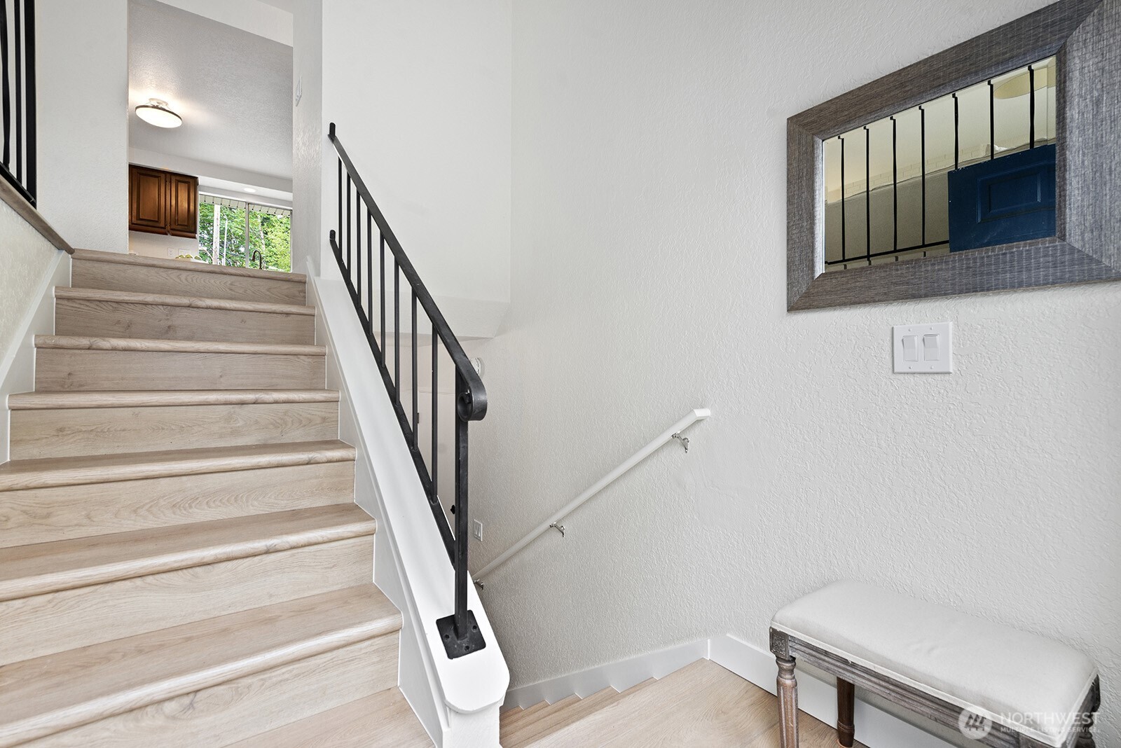 22032 3rd Place West Bothell, WA 98021 - Photo 2 of 20 a view of entryway and hall with wooden floor