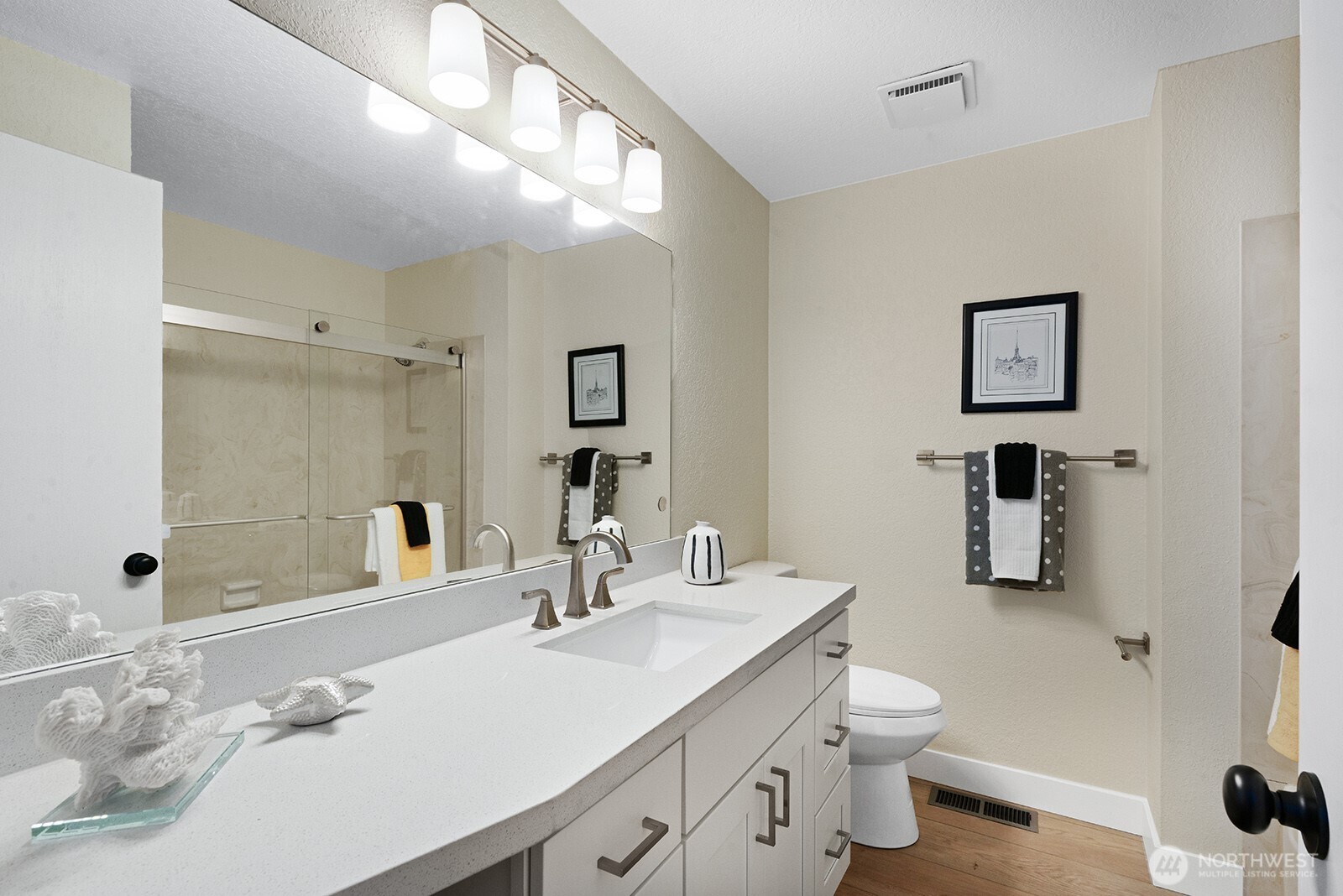 22032 3rd Place West Bothell, WA 98021 - Photo 8 of 20 a bathroom with a sink double vanity and a toilet
