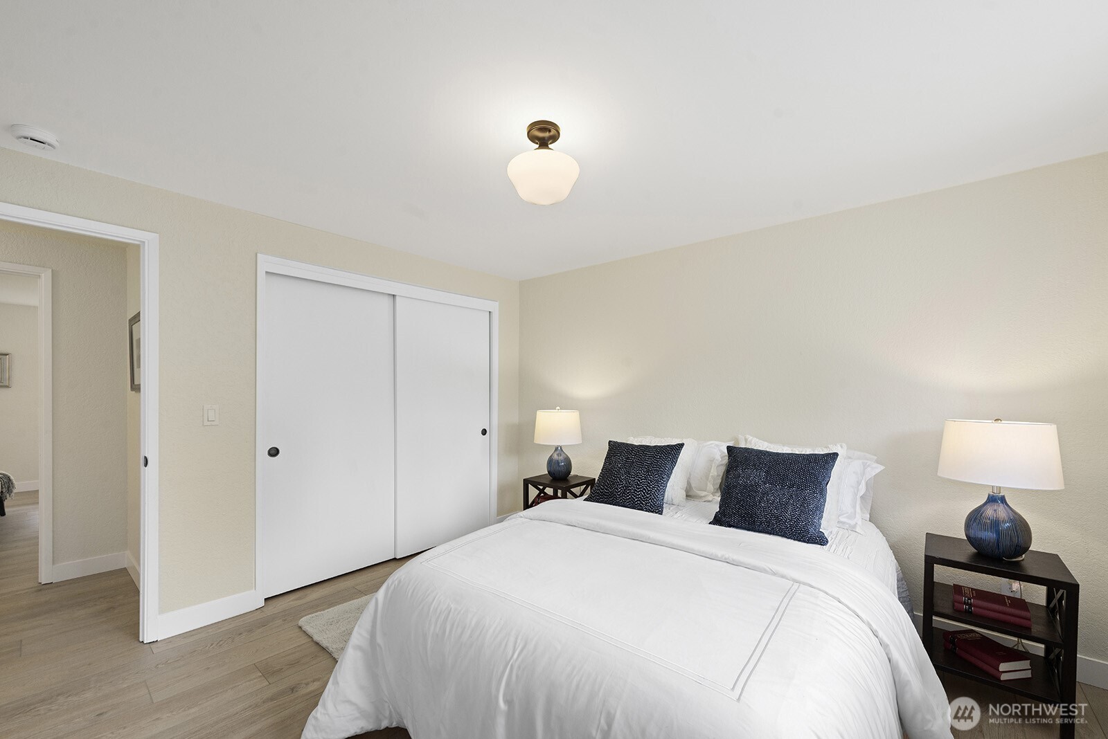 22032 3rd Place West Bothell, WA 98021 - Photo 9 of 20 a bedroom with a bed and a lamp