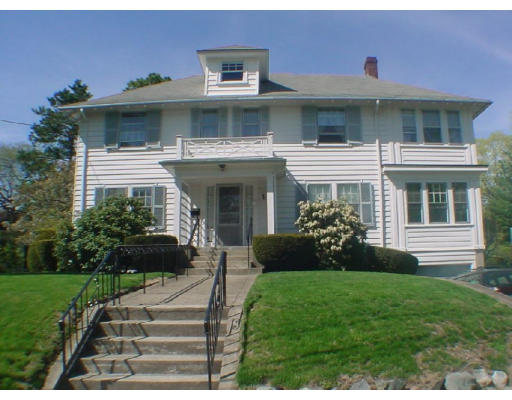 25 Bothfeld Road Newton, MA 02459 - Photo 1 of 6 a front view of a house with a yard and potted plants