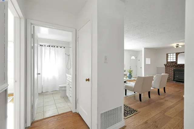 a view of a livingroom with furniture and a window