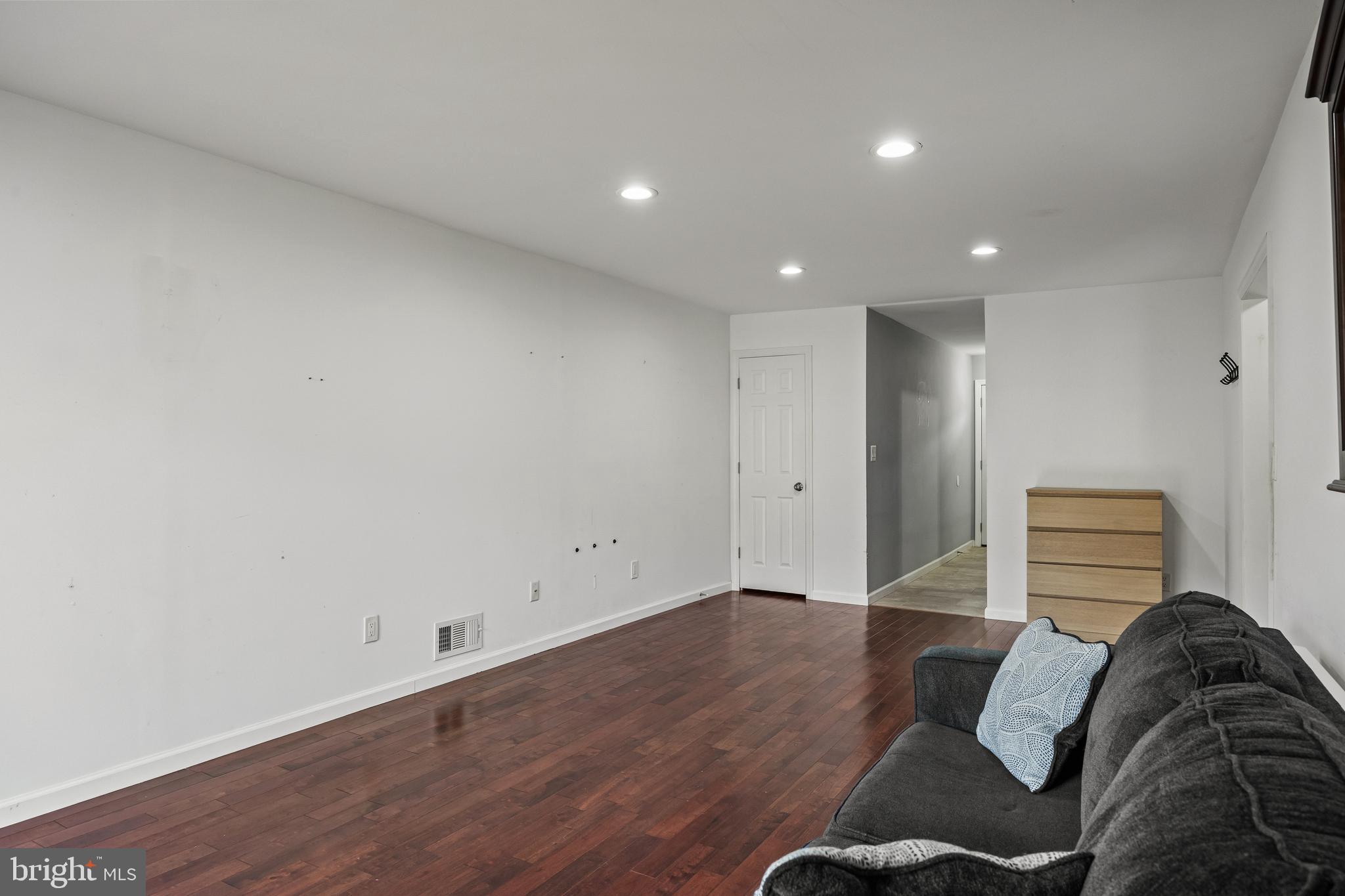 103 Sandstone Court Lumberton, NJ 08048 - Photo 11 of 25 a living room with furniture and a wooden floor