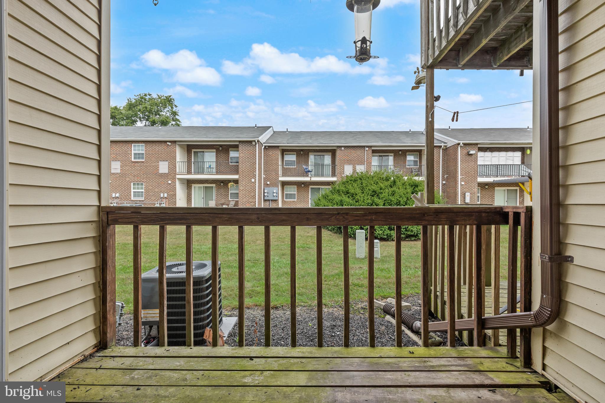 103 Sandstone Court Lumberton, NJ 08048 - Photo 23 of 25 a view of a brick building from a balcony