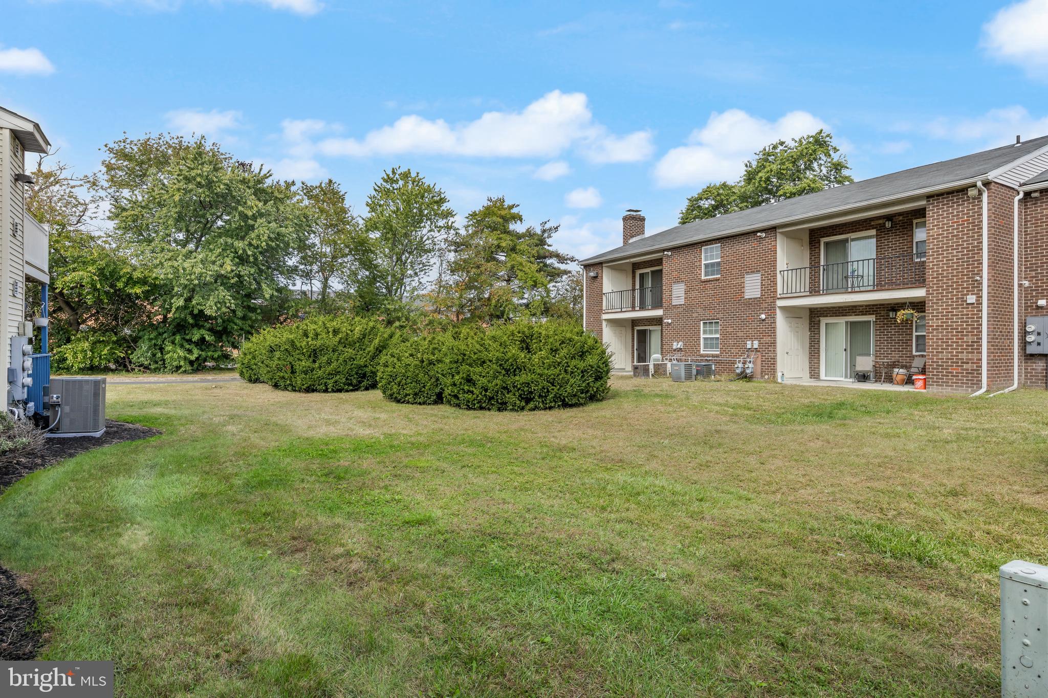 103 Sandstone Court Lumberton, NJ 08048 - Photo 24 of 25 a house view with a garden space
