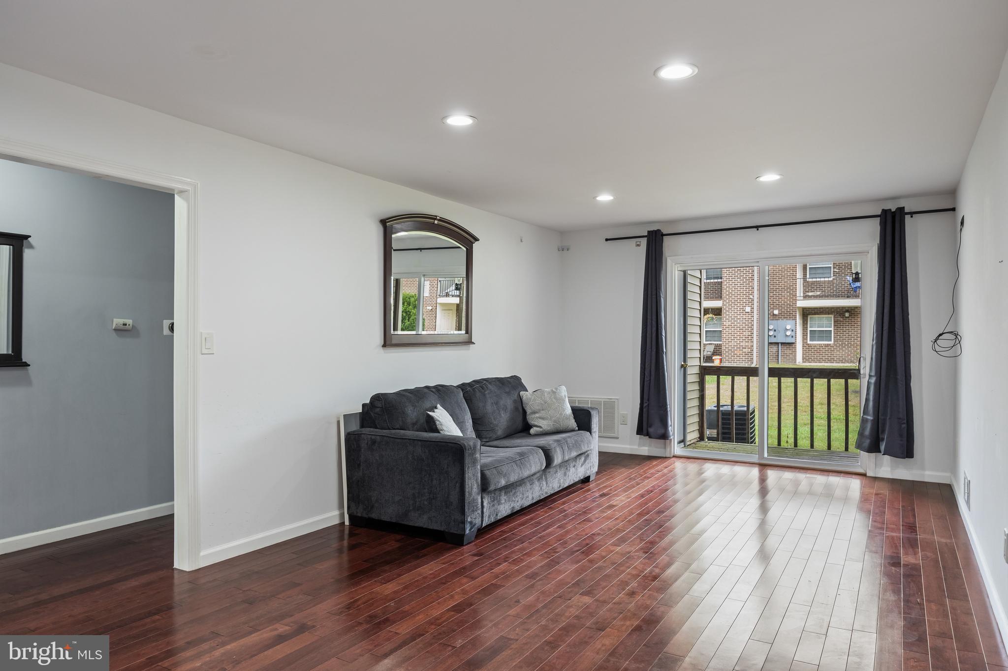 103 Sandstone Court Lumberton, NJ 08048 - Photo 8 of 25 a living room with furniture and a wooden floor