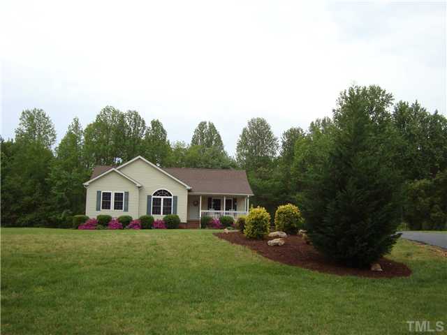 906 Oak Grove Mount Zion Road Roxboro, NC 27574 - Photo 11 of 11 a house view with a garden space