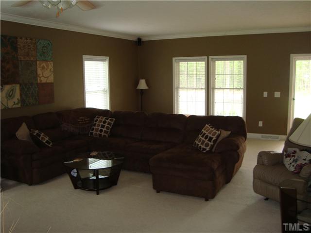 906 Oak Grove Mount Zion Road Roxboro, NC 27574 - Photo 3 of 11 a living room with furniture and a large window