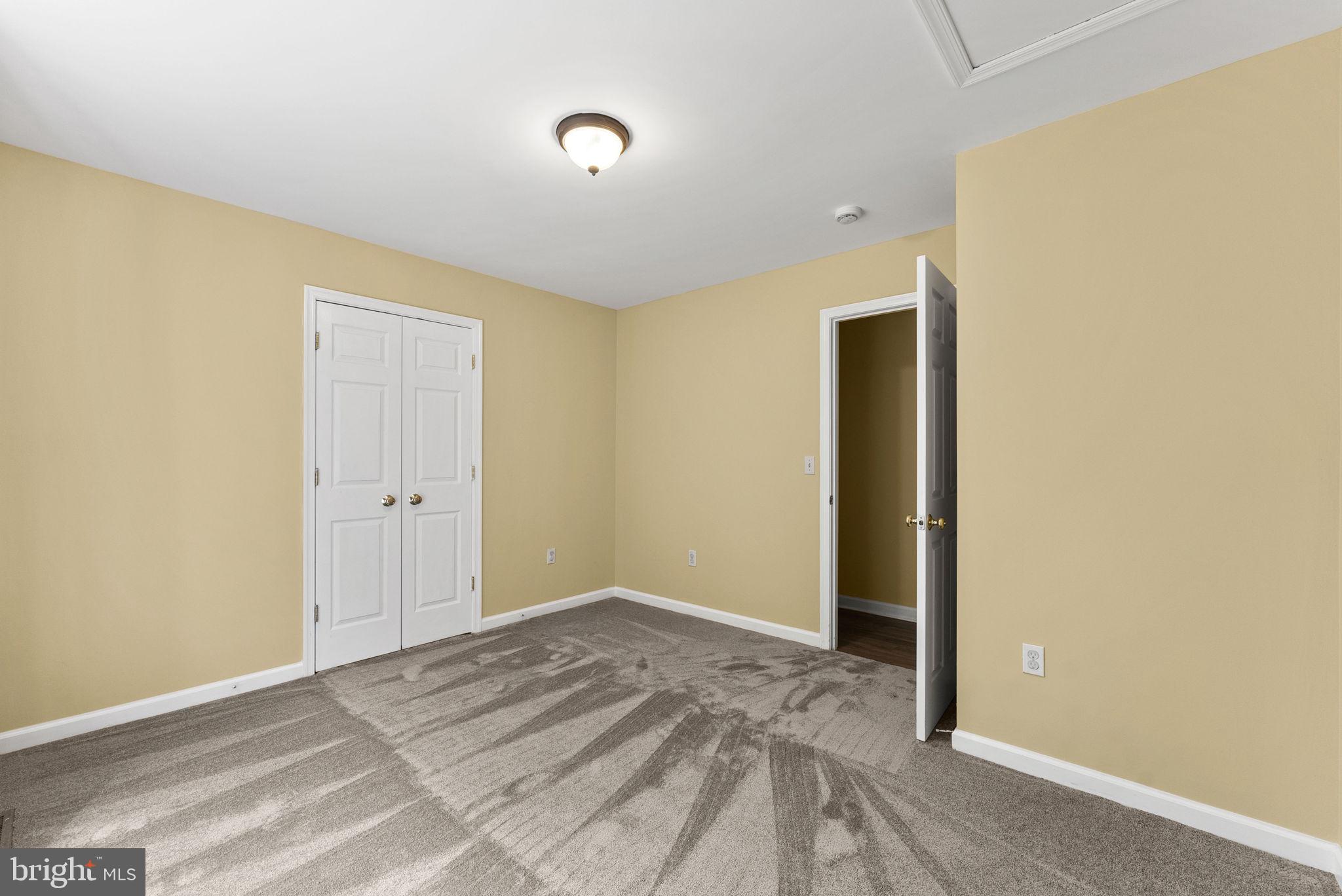 20065 Crooked Run Road Culpeper, VA 22701 - Photo 33 of 62 a view of a big room with wooden floor and windows in a room