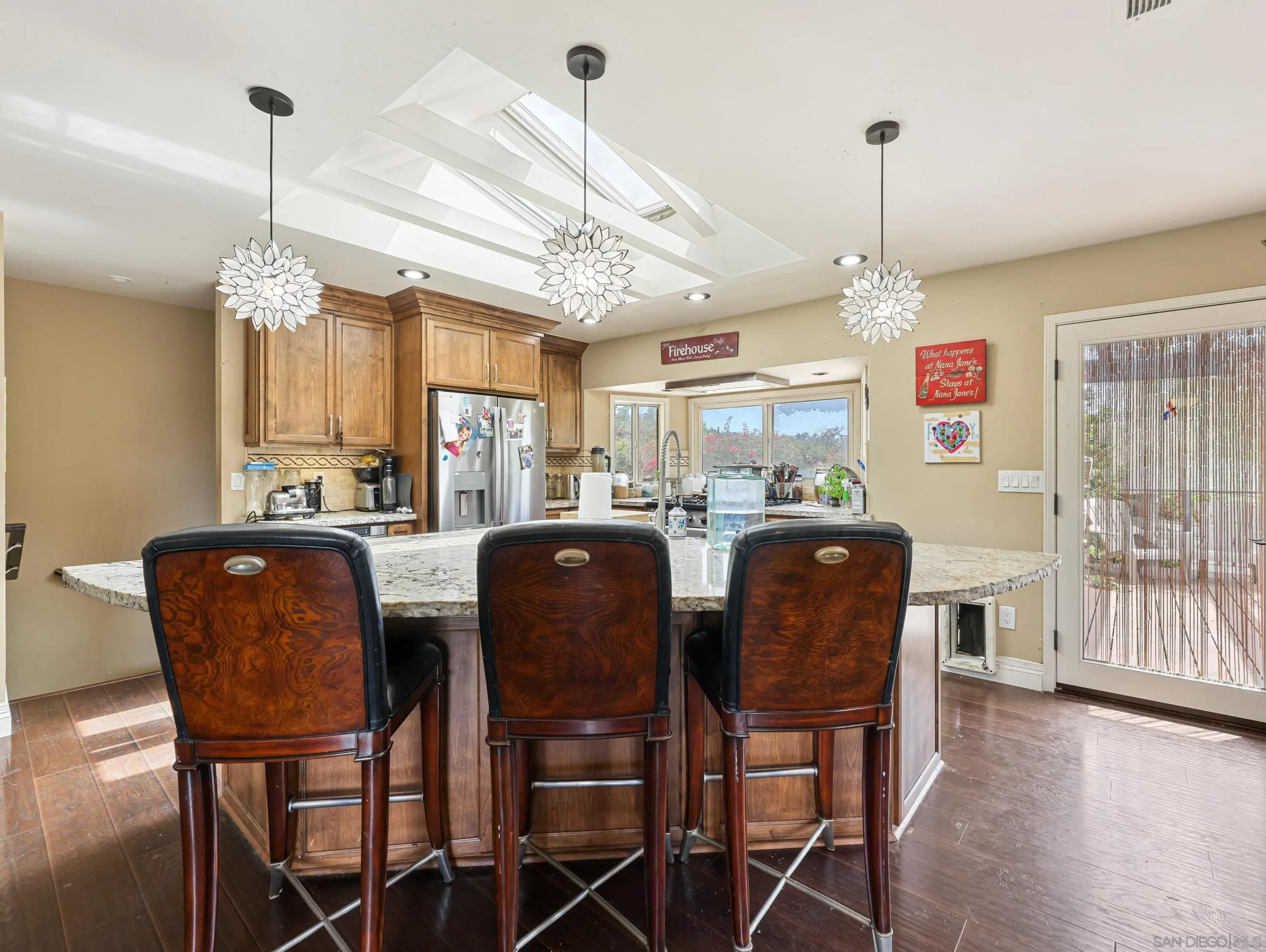 4012 Rogers Road Spring Valley, CA 91977 - Photo 5 of 19 a view of a dining room with furniture window and wooden floor