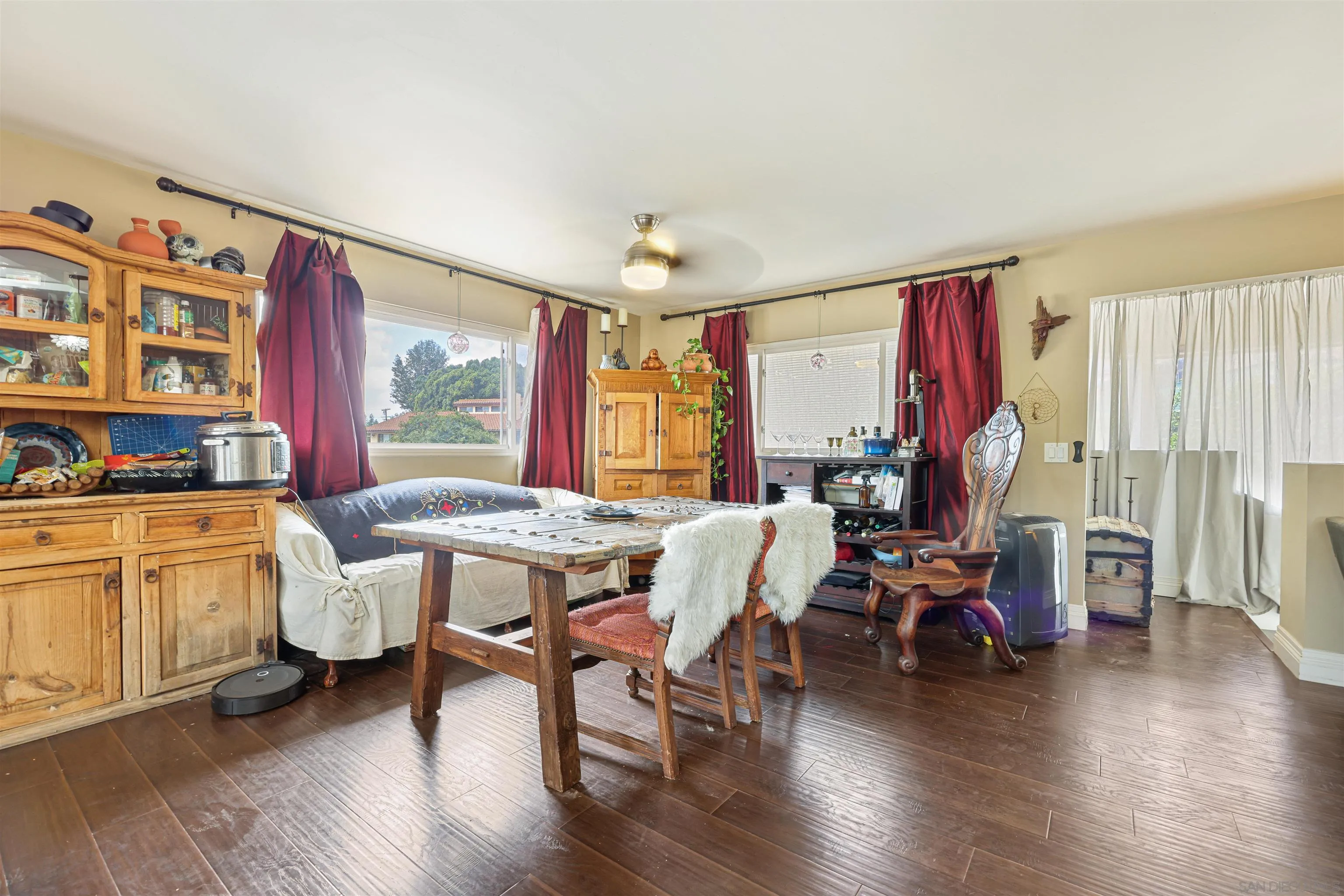4012 Rogers Road Spring Valley, CA 91977 - Photo 8 of 19 a view of a dining room with furniture window and wooden floor