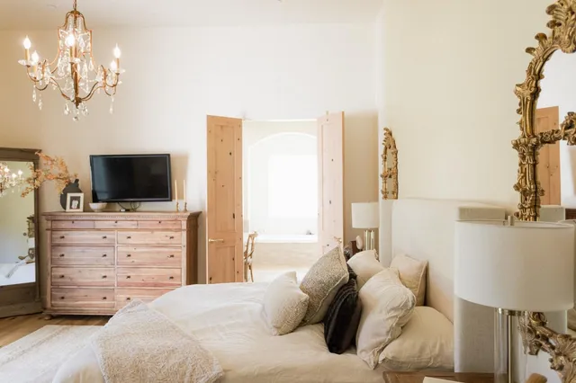 a bathroom with a sink double vanity and a mirror
