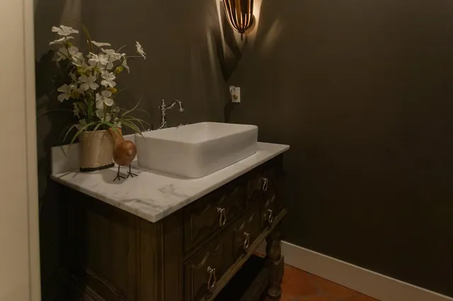 a bathroom with a sink a toilet and a bathtub