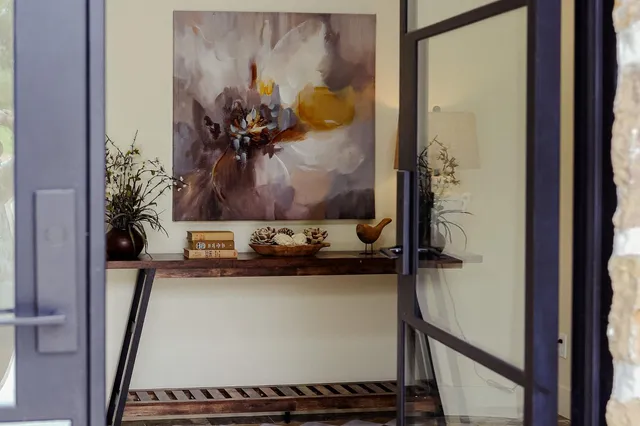 a view of outdoor space with green field and trees