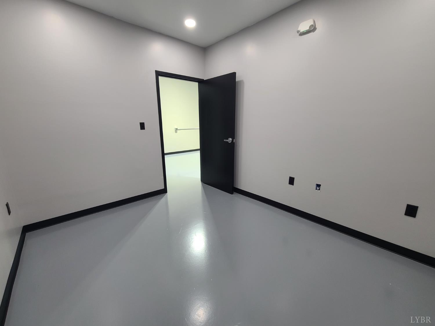 45 Depot Road, Unit 1 Rustburg, VA 24588 - Photo 7 of 10 a view of a hallway with wooden floor