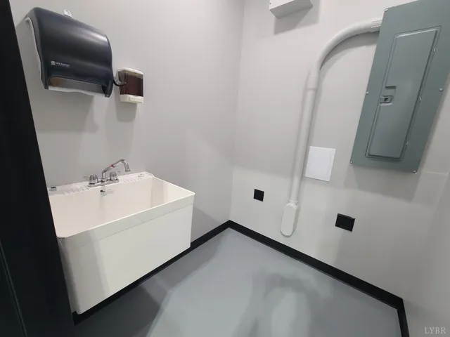 a bathroom with a bathtub and a sink