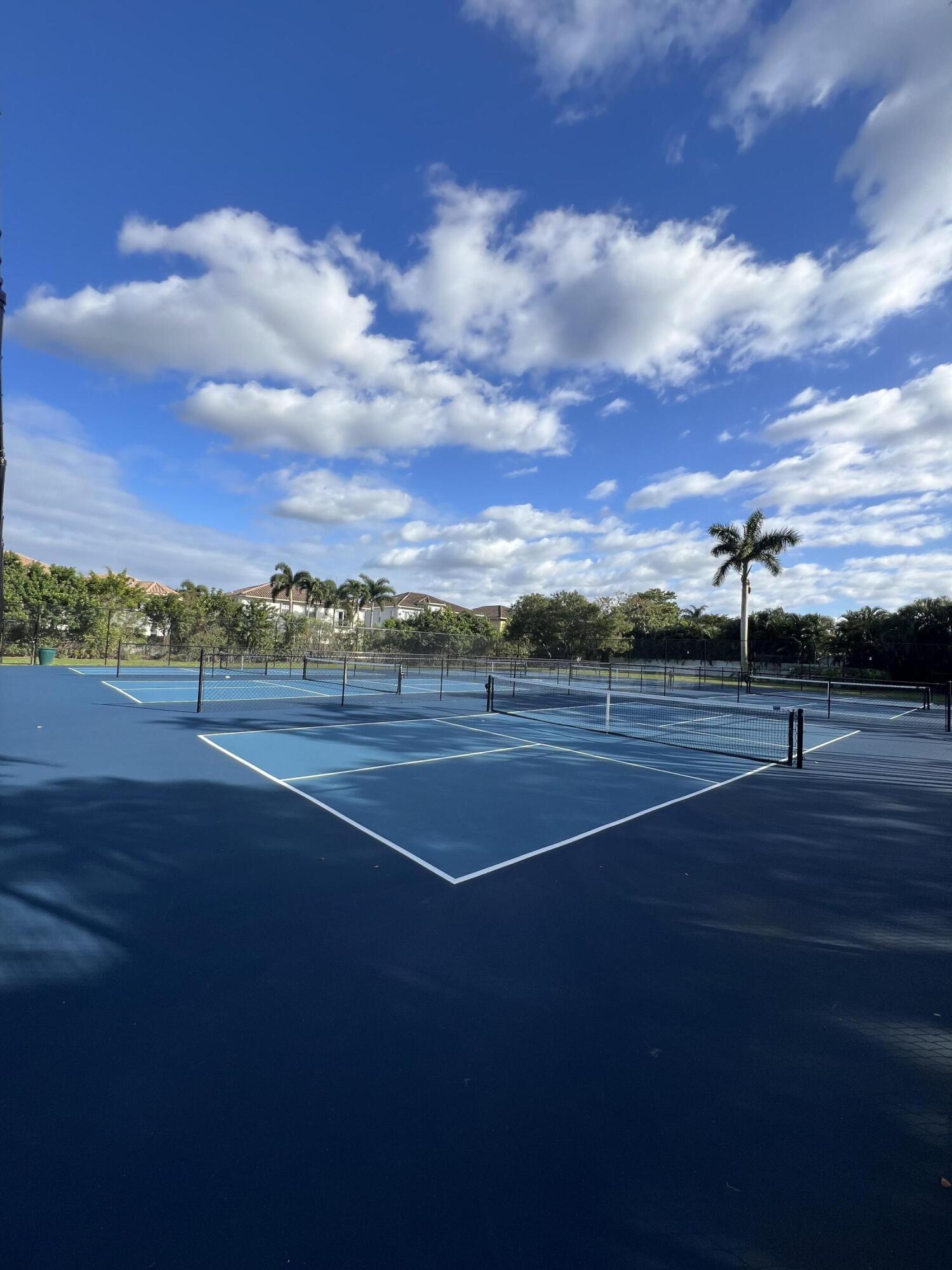 9775 Sun Pointe Drive Boynton Beach, FL 33437 - Photo 27 of 30 a view of tennis court