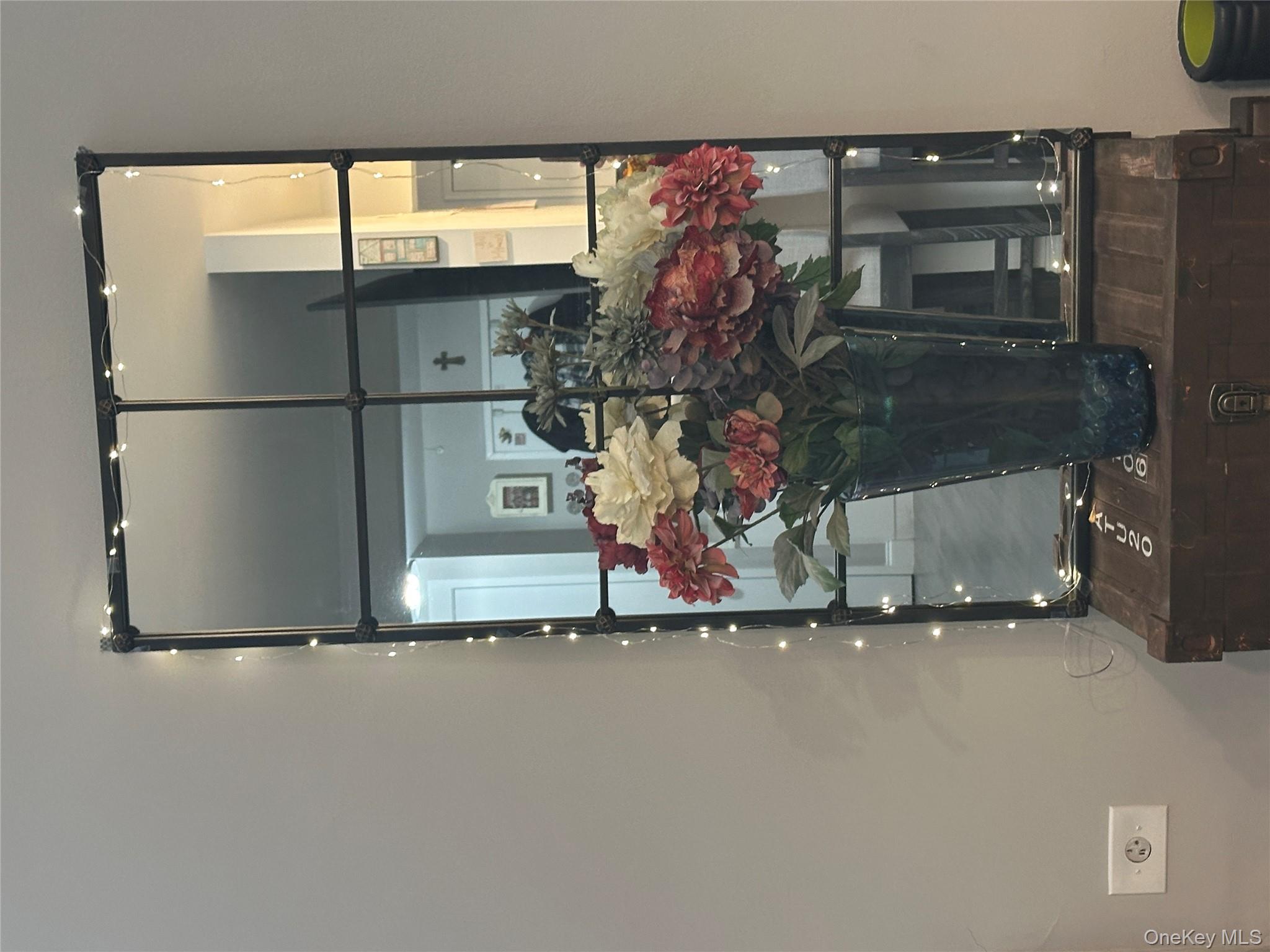 241-20 Northern Boulevard, Unit 1M Queens, NY 11362 - Photo 11 of 31 a vase of flowers sitting on a table