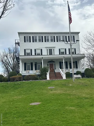 a view of a house with a deck
