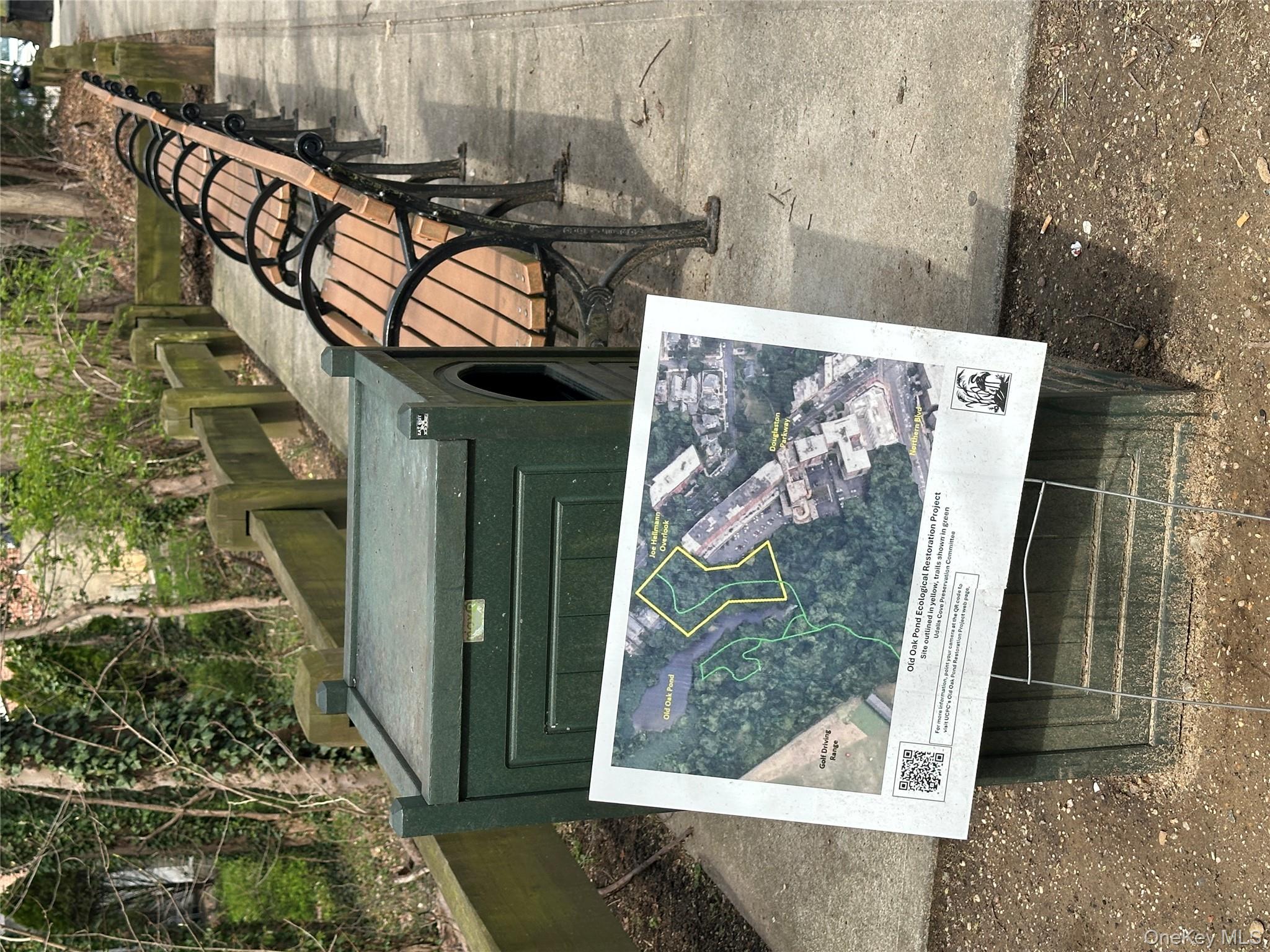 241-20 Northern Boulevard, Unit 1M Queens, NY 11362 - Photo 25 of 31 a view of swimming pool with a bench