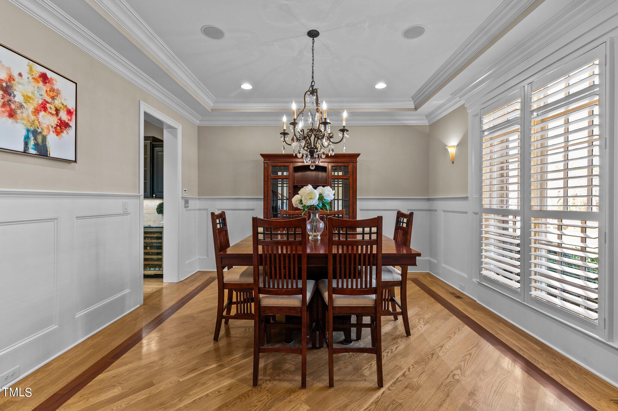 2108 Cadenza Lane Raleigh, NC 27614 - Photo 4 of 43 Stunning moldings, wainscoting and trey ceiling. Recessed lighting and whole house surround.