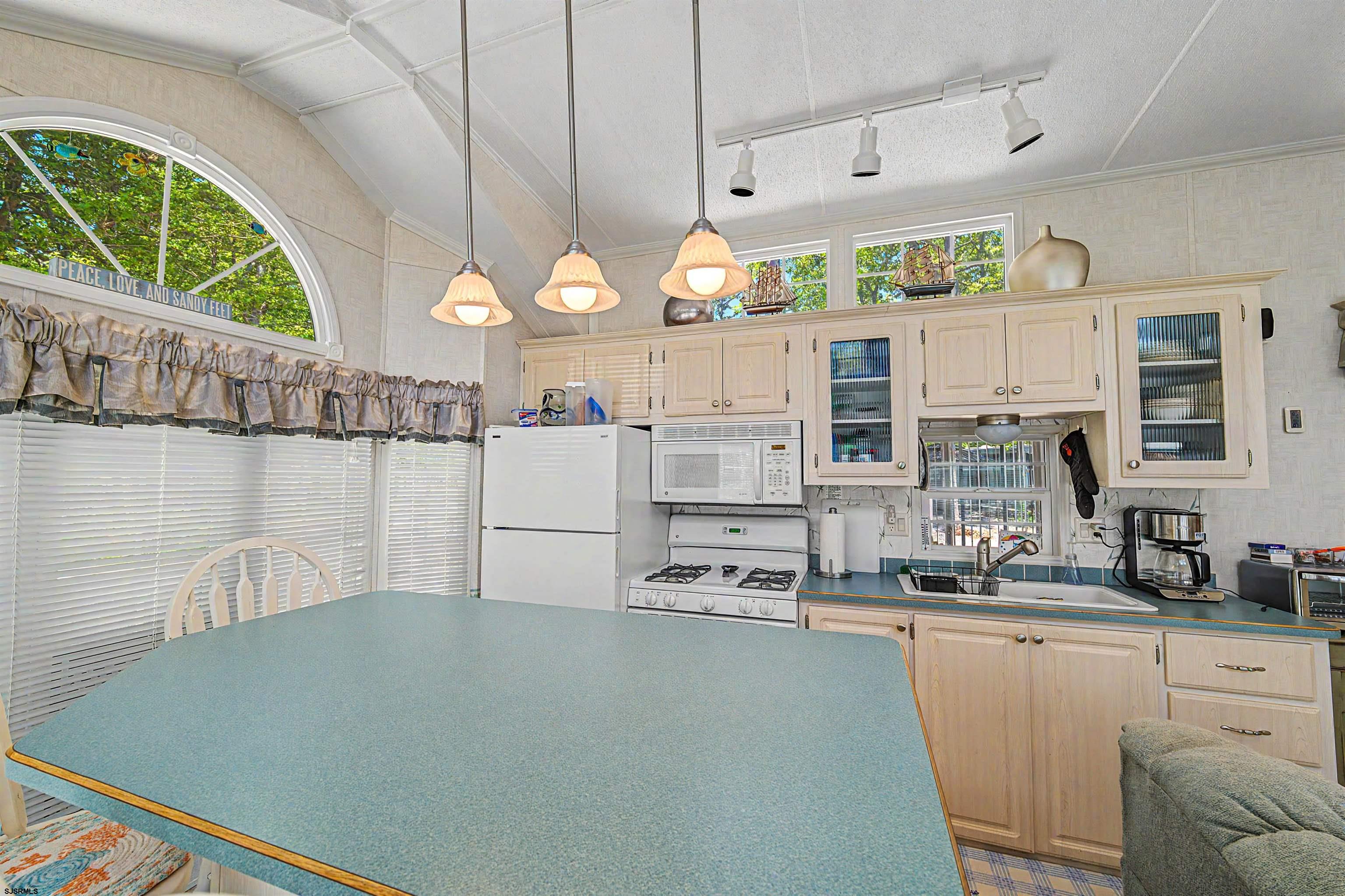 3066 Route 9 Ocean View, NJ 08230 - Photo 14 of 29 a kitchen with stainless steel appliances granite countertop a sink a stove counter space and cabinets