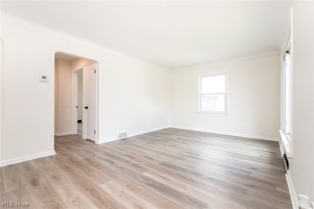 15614 Turney Road Maple Heights, OH 44137 - Photo 2 of 24 Large living room with luxury vinyl floor
