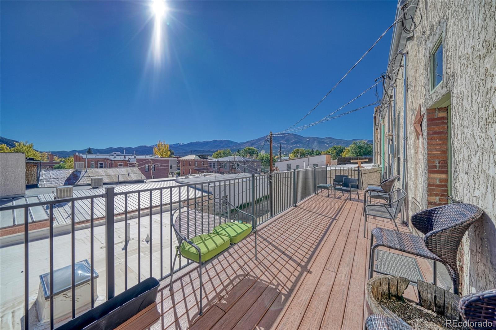 207 F Street, Unit 2 Salida, CO 81201 - Photo 22 of 23 a view of a balcony with wooden floor and city view