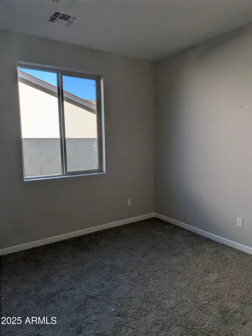 a kitchen with a sink and stove