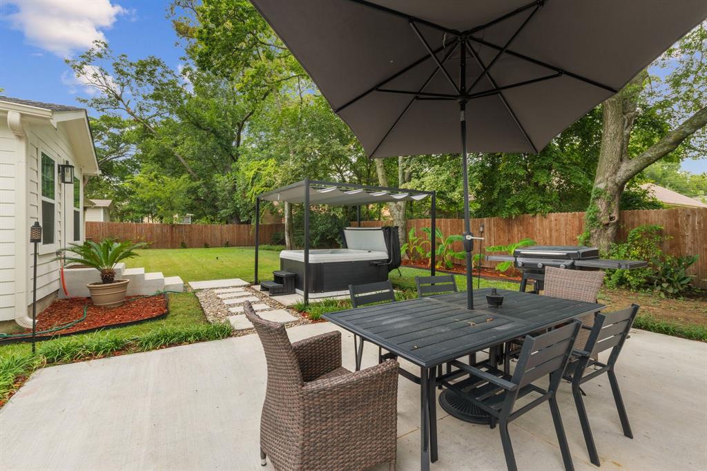 408 East Liberty Street Pilot Point, TX 76258 - Photo 29 of 31 a view of a patio with furniture and a yard