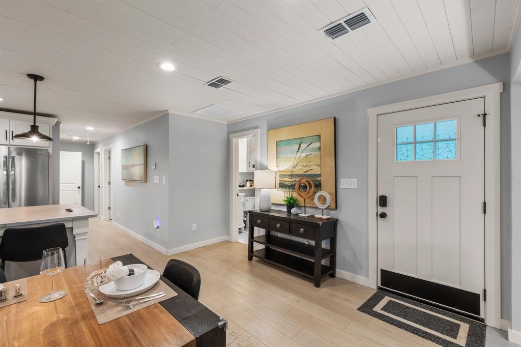 408 East Liberty Street Pilot Point, TX 76258 - Photo 7 of 31 a view of a livingroom with furniture and windows