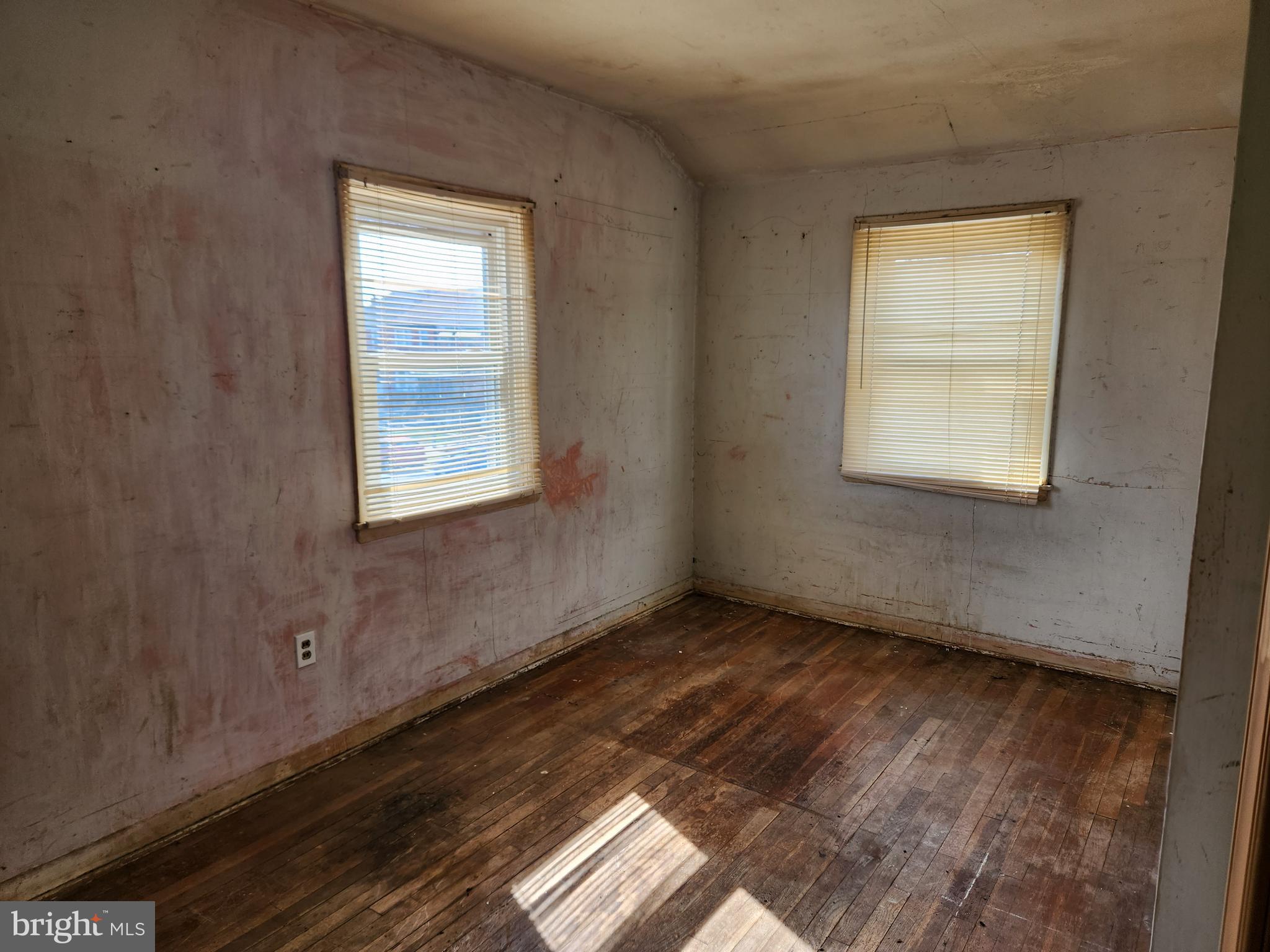 2041 Jasmine Road Baltimore, MD 21222 - Photo 13 of 21 a view of an empty room and window