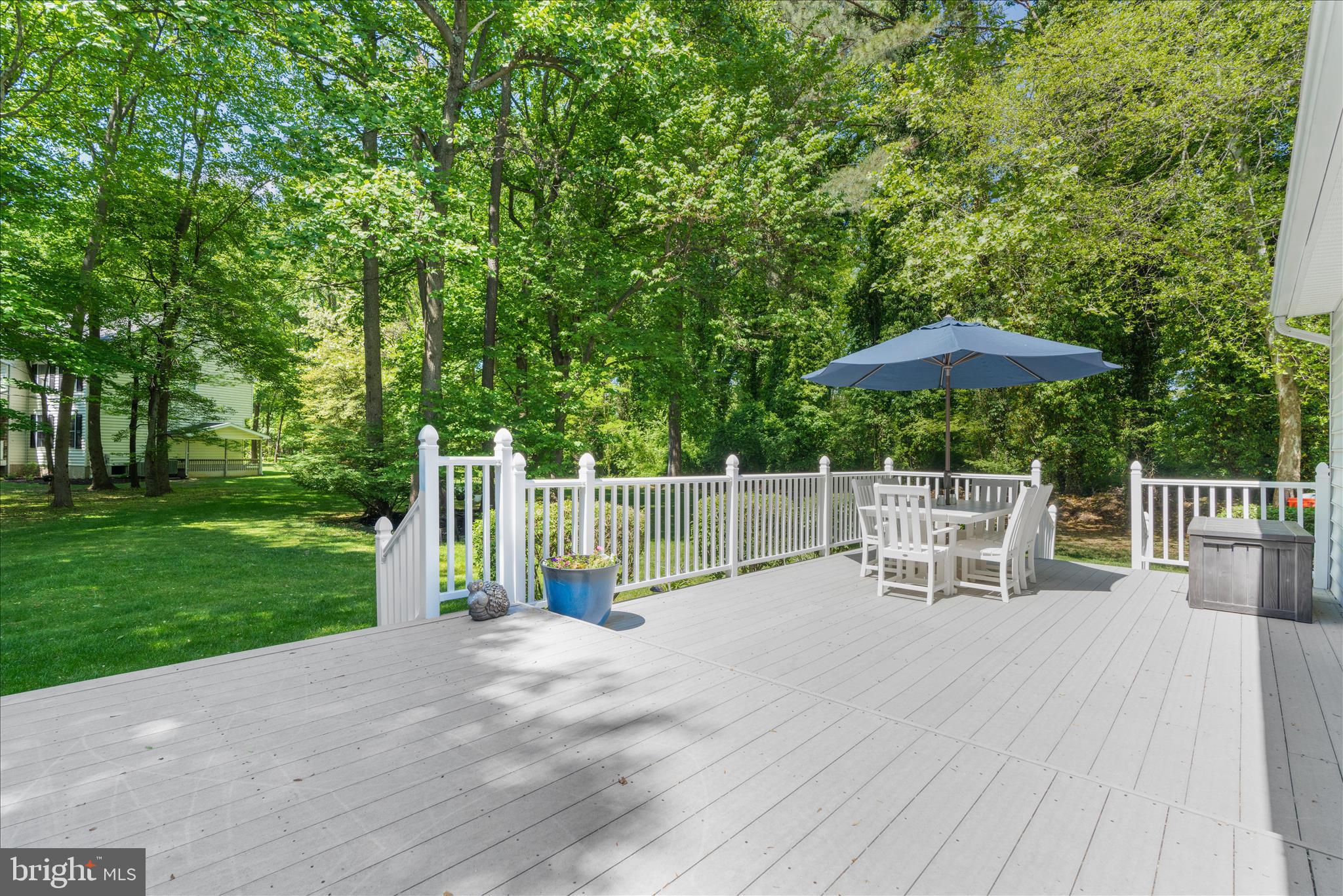 1848 Cherry Road Annapolis, MD 21409 - Photo 37 of 57 a view of a chairs and table on the wooden deck
