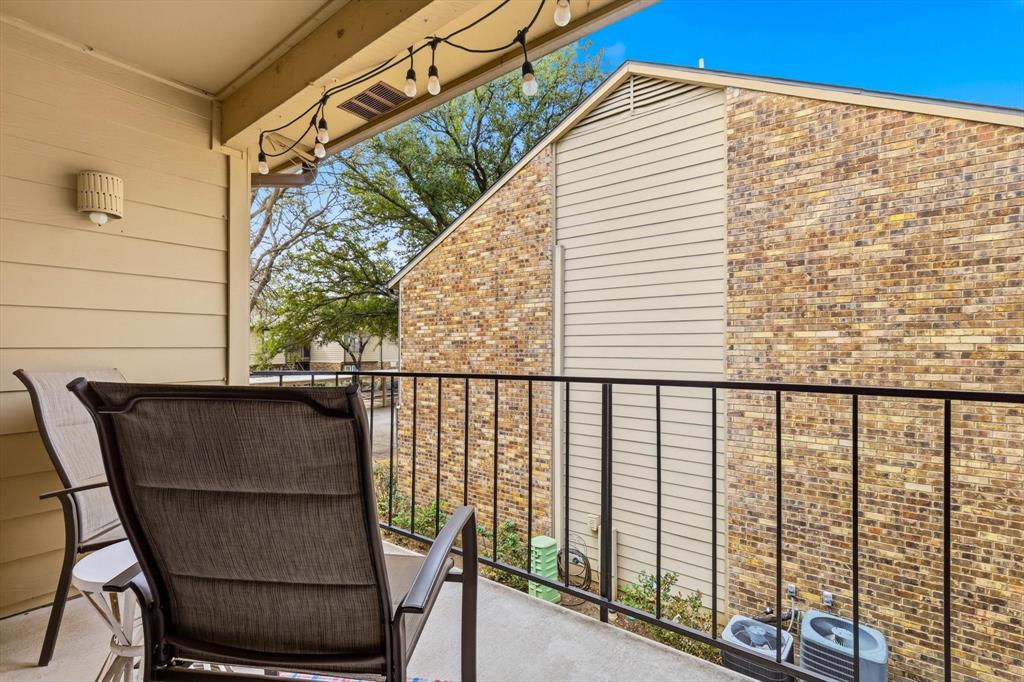 5300 Keller Springs Road, Unit 2057 Dallas, TX 75248 - Photo 29 of 35 a view of balcony with furniture