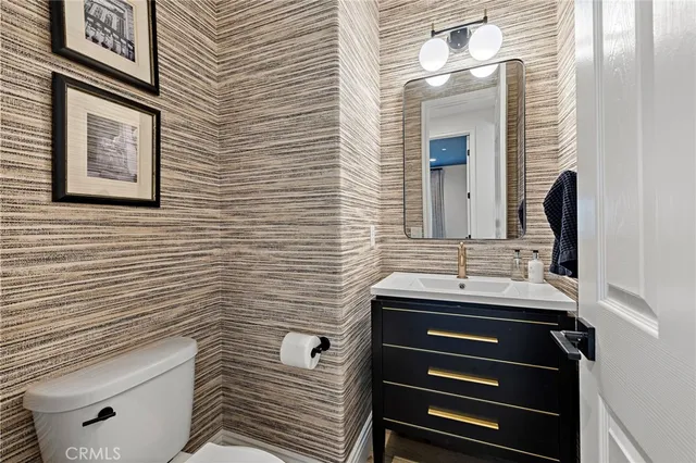 a view of a patio with couches a table and a fire pit