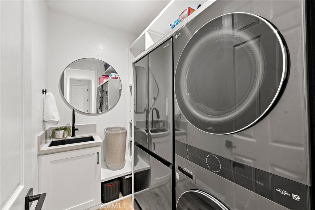 1 Drackert Lane Ladera Ranch, CA 92694 - Photo 33 of 57 a close view of light fixtures and washer