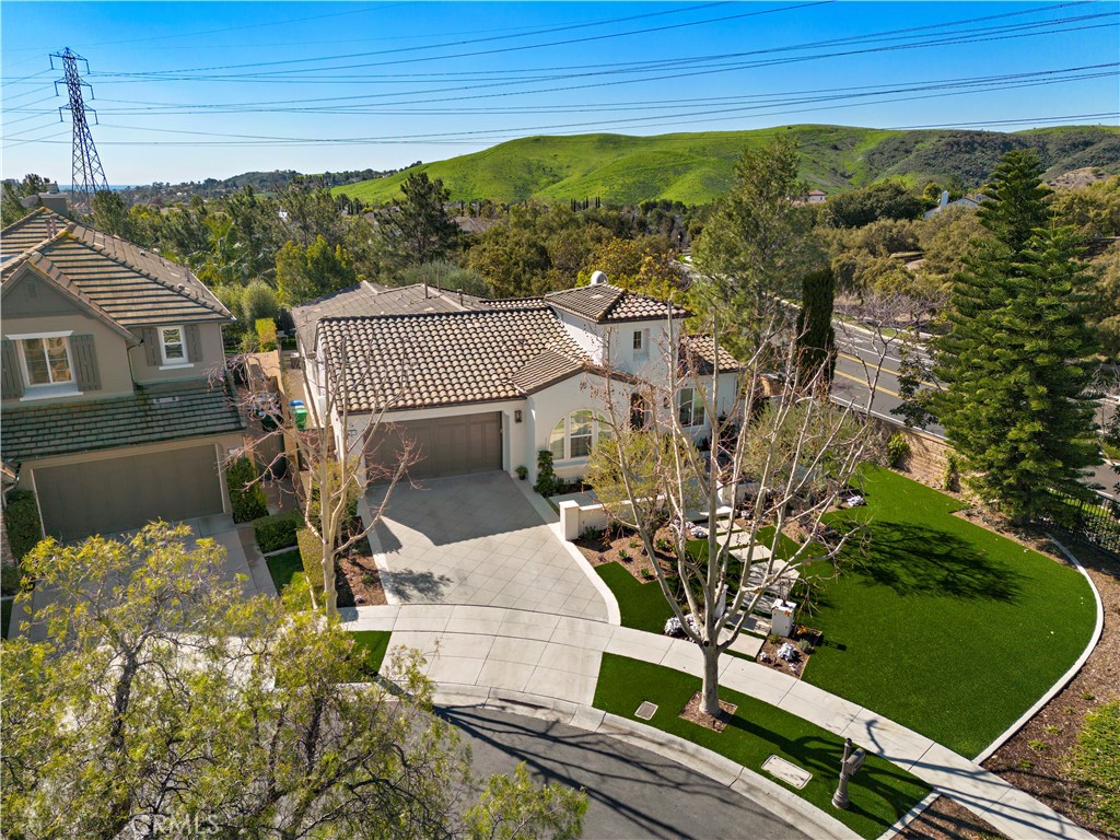 1 Drackert Lane Ladera Ranch, CA 92694 - Photo 50 of 57 an aerial view of a house with a garden