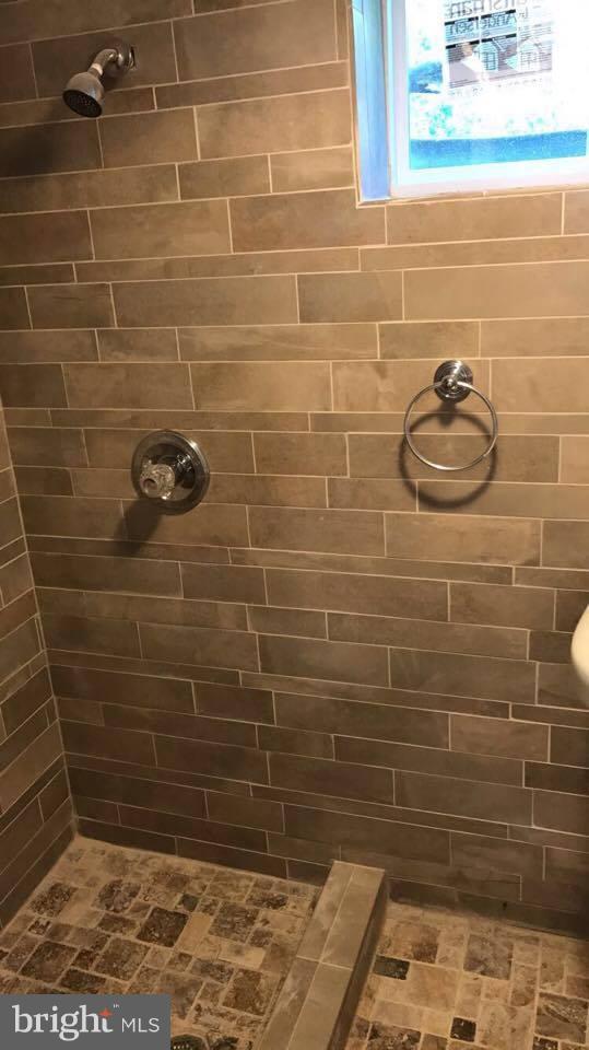 9671 Clarkes Road Bealeton, VA 22712 - Photo 9 of 12 a bathroom with a shower