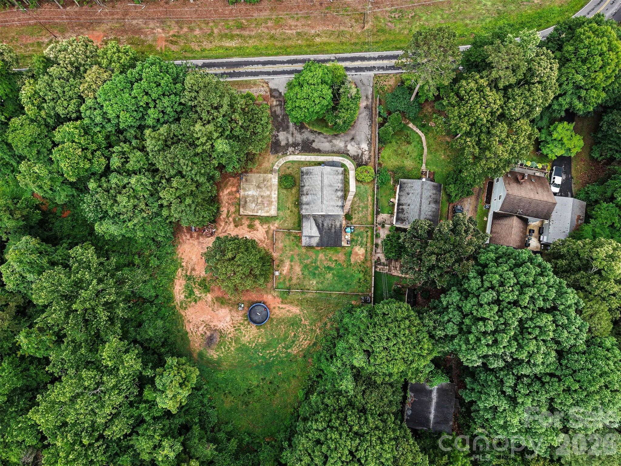 184 Canal Road Belmont, NC 28012 - Photo 16 of 39 an aerial view of a house with outdoor space and street view